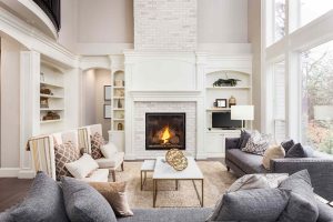 6 Easy Ways to Refresh an Outdated Fireplace Without Knocking It Down, According to Contractors